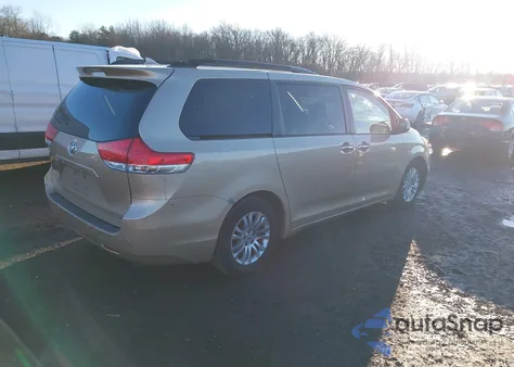 2011 Toyota Sienna Xle V6 z USA, uszkodzony, nr VIN 5TDYK3DC6BS004833